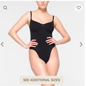 NWOT Skims seamless sculpt thong body suit in Onyx; size S/M